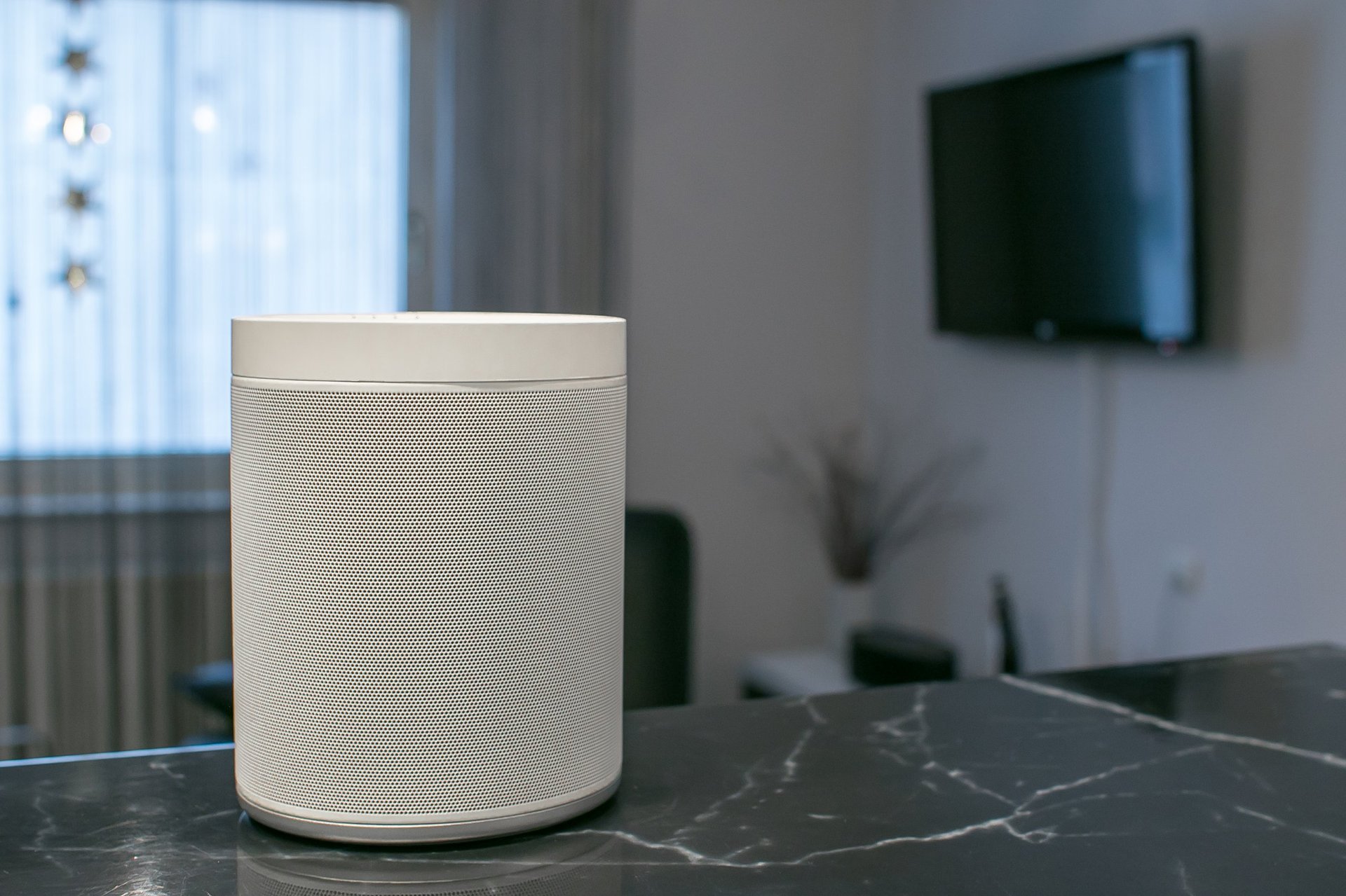 Smart wireless speaker on the table in the living room