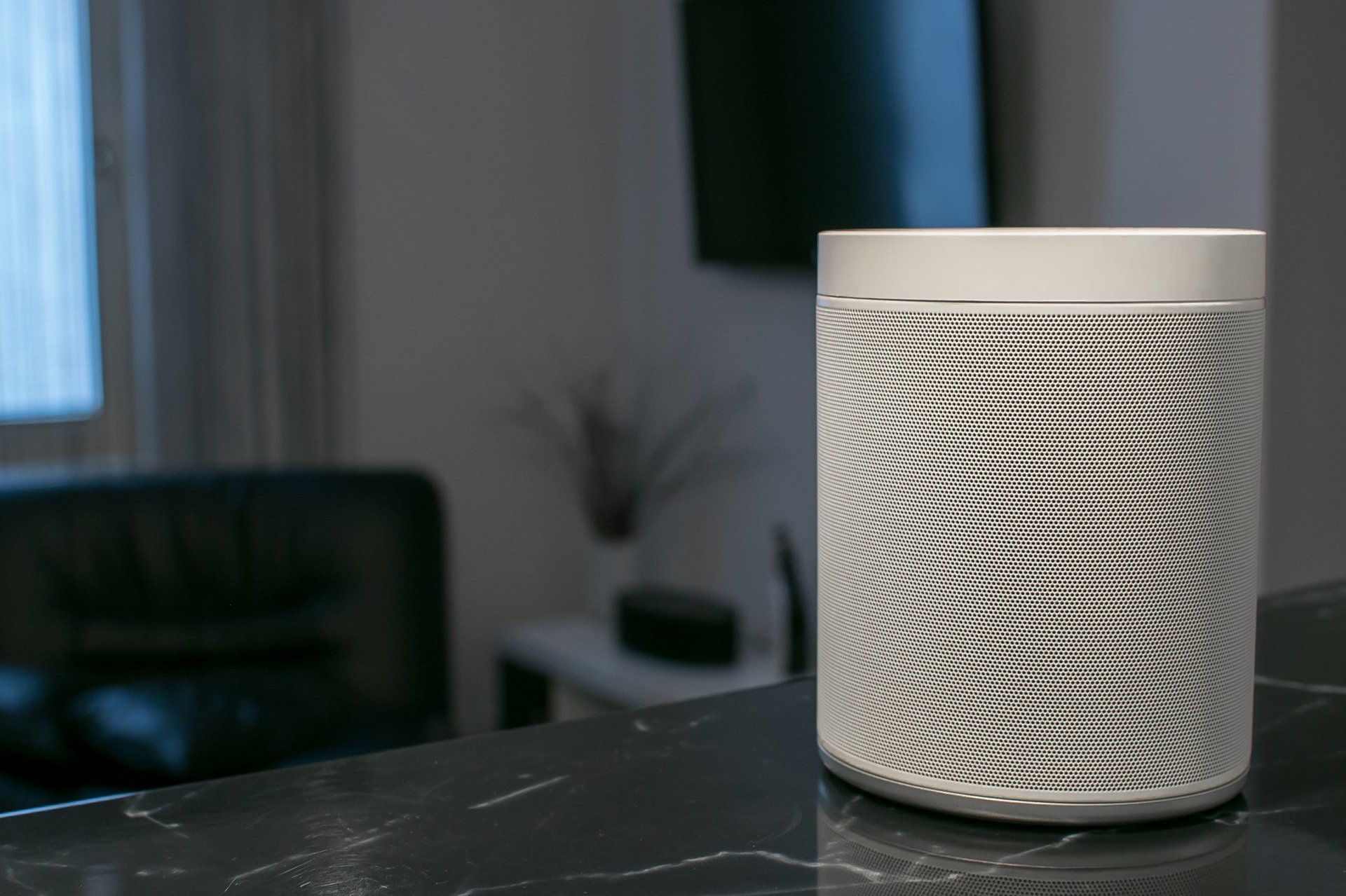 Smart wireless speaker on the table in the living room